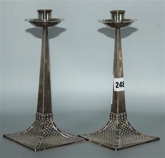 Pair Arts & Crafts silver candlesticks